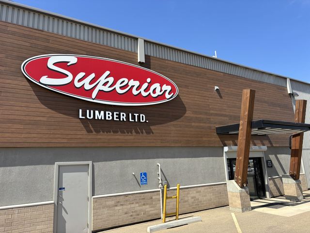 Exterior of Superior Lumber Ltd. building with prominent signage.