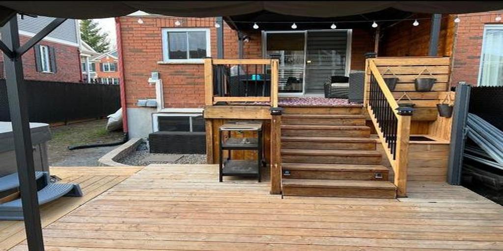 Modern Wooden Deck with Stairs and Railing